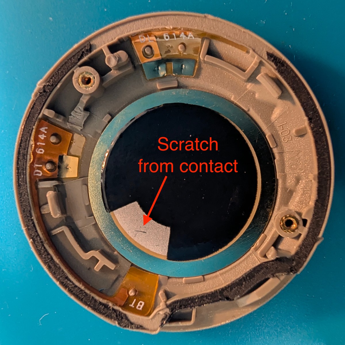 Casing top-down view showing contact scratch mark